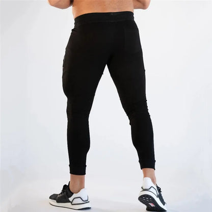 Pantalones de chándal ajustados de gimnasio para hombres, para correr, fitness, culturismo, bolsillo con cremallera, algodón