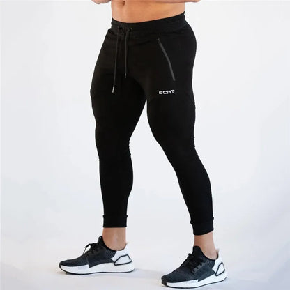 Pantalones de chándal ajustados de gimnasio para hombres, para correr, fitness, culturismo, bolsillo con cremallera, algodón