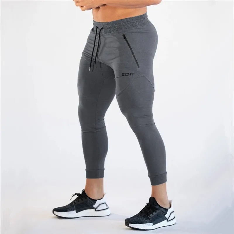 Pantalones de chándal ajustados de gimnasio para hombres, para correr, fitness, culturismo, bolsillo con cremallera, algodón